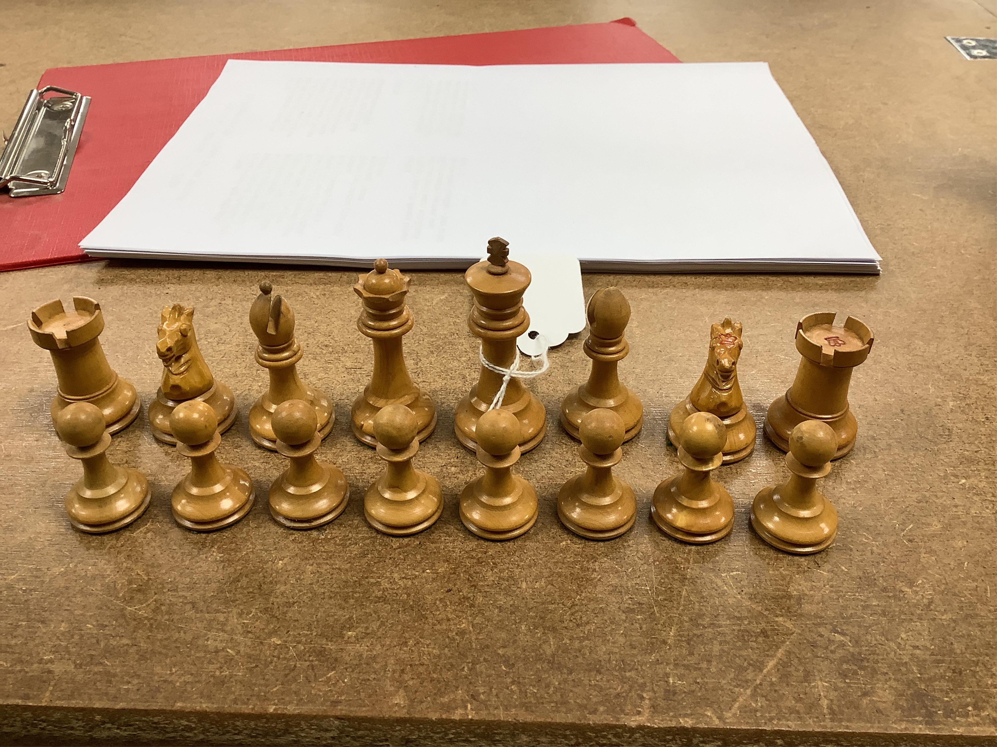 A chess set, possibly F H Ayres, in a mahogany box, and another larger weighted chess set, in box, Ayres Kings 6cm. Condition - good